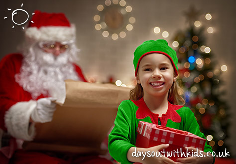 bigstock-Santa-and-an-elf-getting-ready-106336133