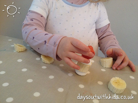 making a banana father Christmas on #Daysoutwithkids