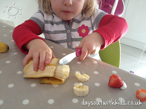 Chopping a banana on #Daysoutwithkids