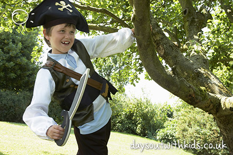 bigstock-Boy-in-pirate-costume-swinging-47827259