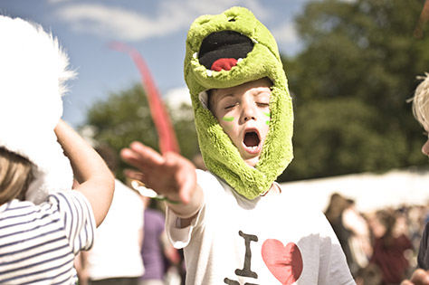 boy wearing frog hat