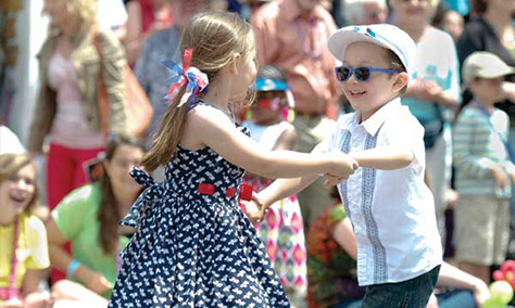 young girl and boy dancing