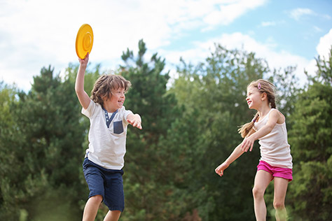 bigstock-Happy-boy-and-girl-playing-wit-110270420