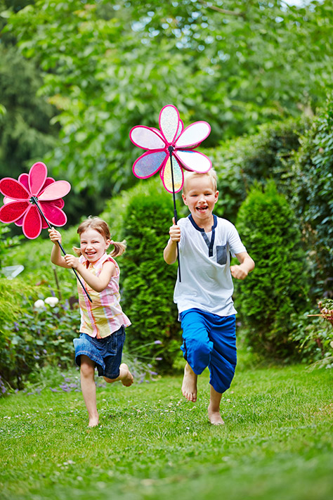 bigstock-Two-happy-children-running-wit-120806903