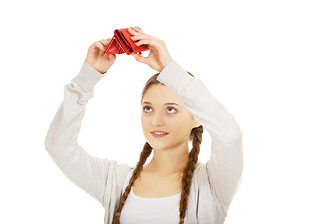 Young unhappy woman with empty purse.