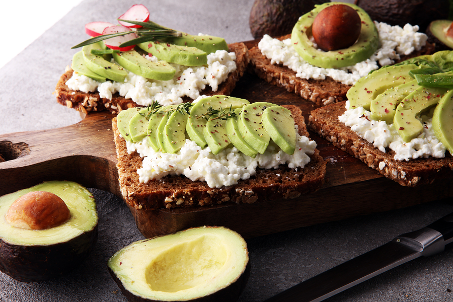 sliced avocado on toast bread with spices - Picniq Blog